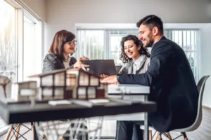 side-view-image-of-young-happy-family-sitting-in-consulting-office-making