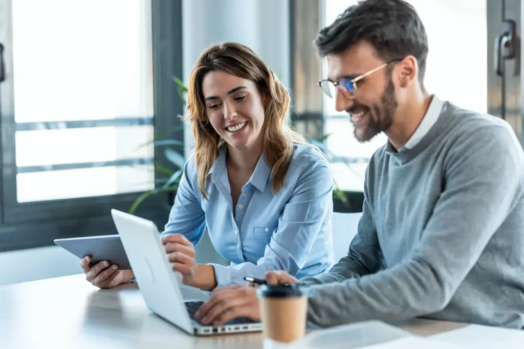 shot-of-smart-business-people-working-with-plans-while-talking-of-their-new-design-business-in-the-office