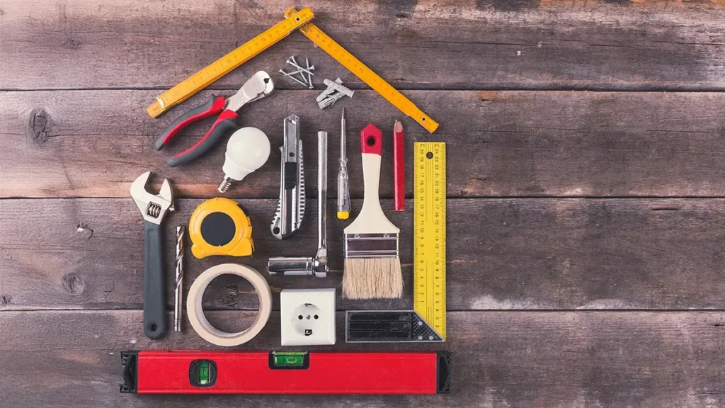 DIY tools on old wooden background