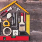 DIY tools on old wooden background