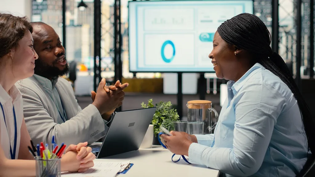 Property owners filling out rental registration forms.