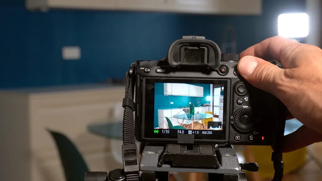 Photographer man taking pictures and video in apartment as part of St. Louis rental property marketing