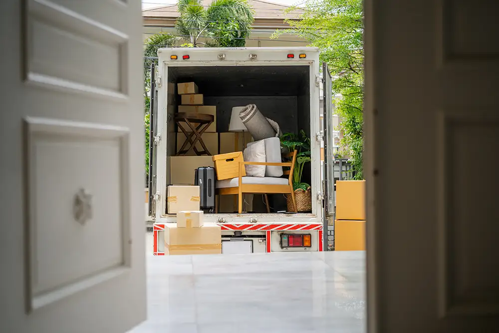 the back of a truck carrying goods moving house