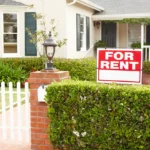 House with For Rent sign